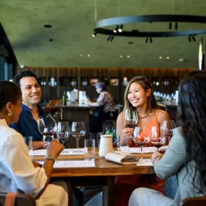 Yarra Valley Wine tour - Group of four people enjoying tasting at Huberts Estate