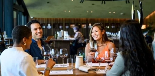 Yarra Valley Wine tour - Group of four people enjoying tasting at Huberts Estate